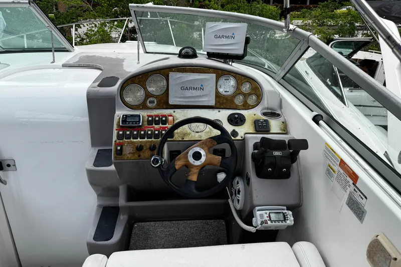 Slide: The Image of 2007 Rinker 300 Fiesta Vee boat dashboard with Garmin navigation system. - 9