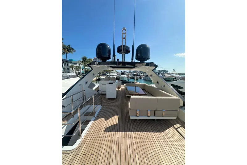 Slide: The Image of Luxurious 2026 Astondoa 66 Fly yacht with spacious deck and elegant seating area. - 11