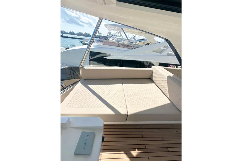 Slide: The Image of Luxurious 2026 Astondoa 66 Fly yacht interior with elegant seating and teak flooring. - 16