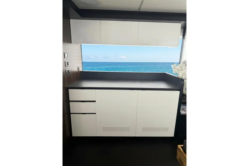 Slide: The Image of Modern kitchen interior on 2026 Astondoa 66 Fly yacht with ocean view. - 18