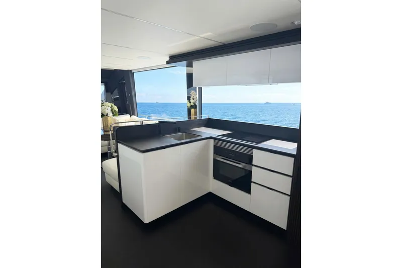 Slide: The Image of Modern kitchen interior on 2026 Astondoa 66 Fly yacht with ocean view. - 19