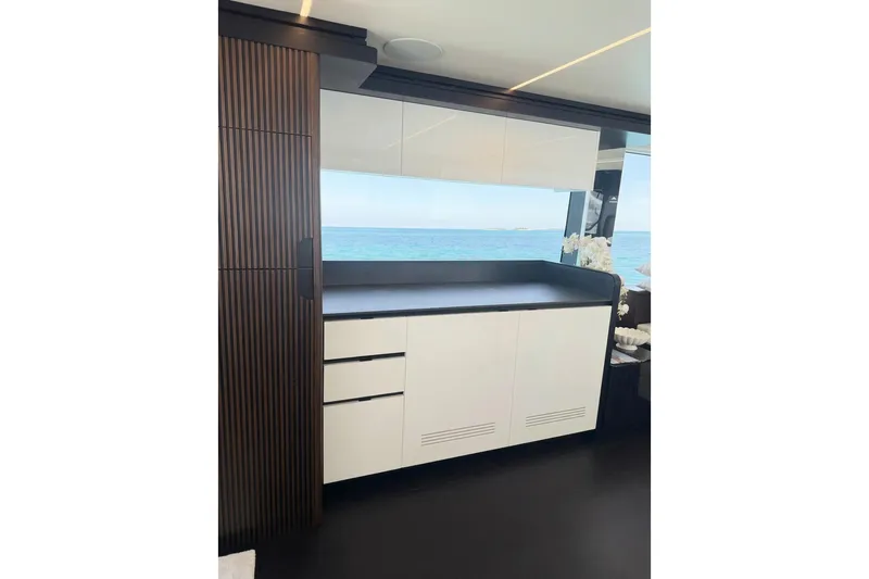 Slide: The Image of Modern kitchen interior on 2026 Astondoa 66 Fly yacht with ocean view. - 20