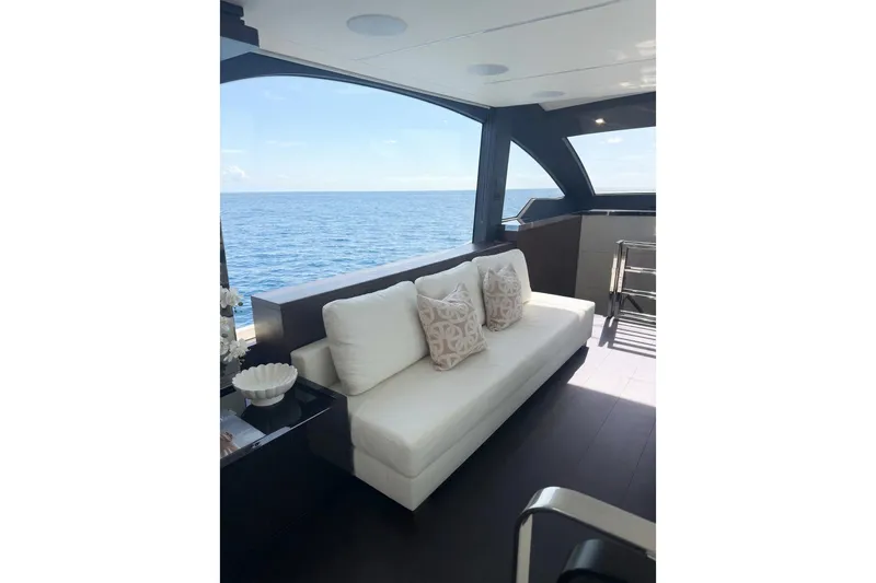 Slide: The Image of Luxurious interior of 2026 Astondoa 66 Fly yacht with ocean view and elegant seating. - 21