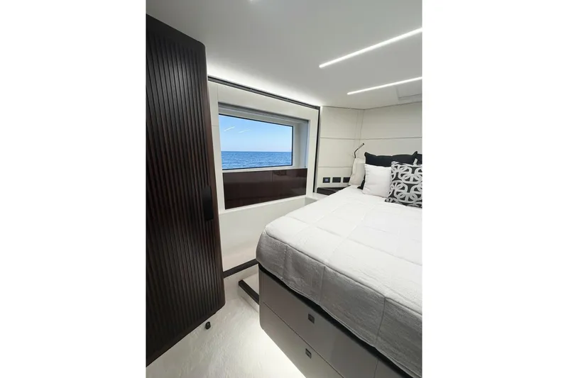 Slide: The Image of Luxurious bedroom interior of 2026 Astondoa 66 Fly yacht with ocean view. - 25