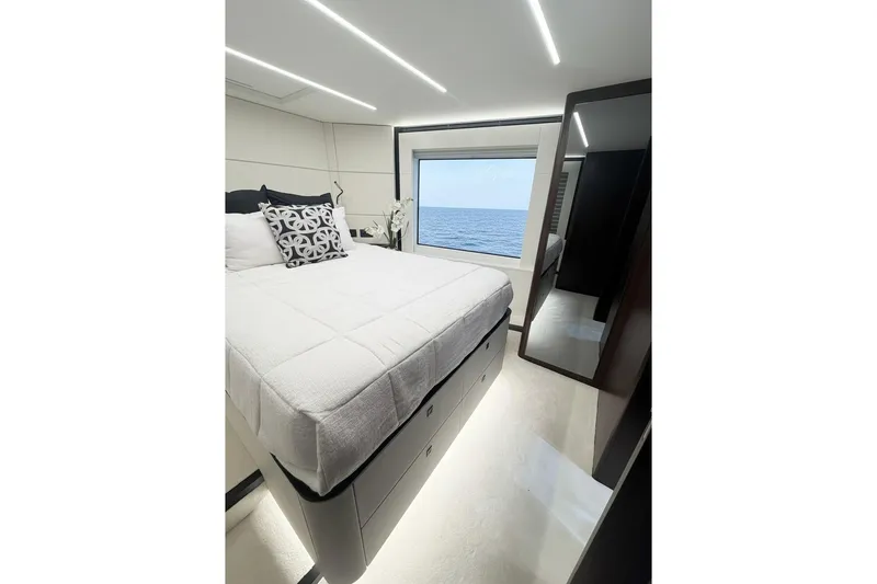 Slide: The Image of Luxurious bedroom interior on 2026 Astondoa 66 Fly yacht with ocean view. - 27