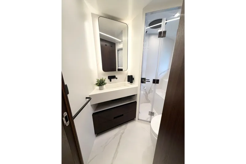 Slide: The Image of Luxurious bathroom in 2026 Astondoa 66 Fly yacht, featuring modern fixtures and elegant design. - 28