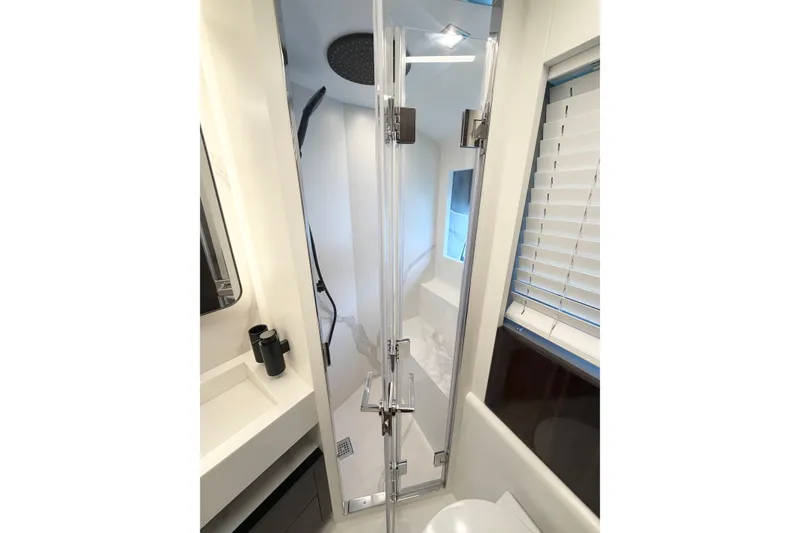 Slide: The Image of Luxurious bathroom in 2026 Astondoa 66 Fly yacht with modern shower and sleek design. - 29