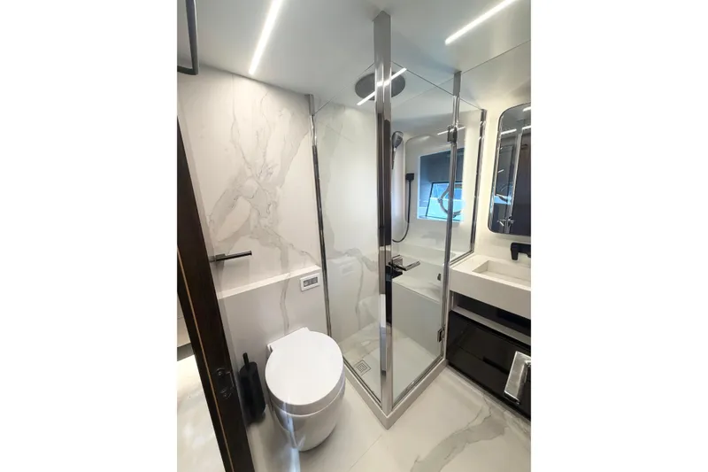 Slide: The Image of Luxurious bathroom in 2026 Astondoa 66 Fly yacht with modern fixtures and elegant design. - 30