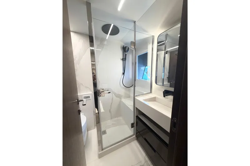 Slide: The Image of Luxurious bathroom in 2026 Astondoa 66 Fly yacht with modern shower and sleek design. - 31