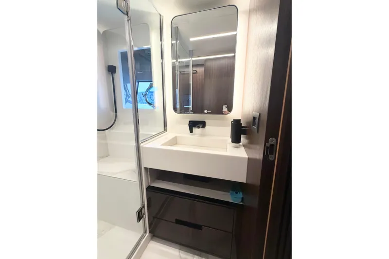 Slide: The Image of Luxurious bathroom in 2026 Astondoa 66 Fly yacht with modern fixtures and sleek design. - 32