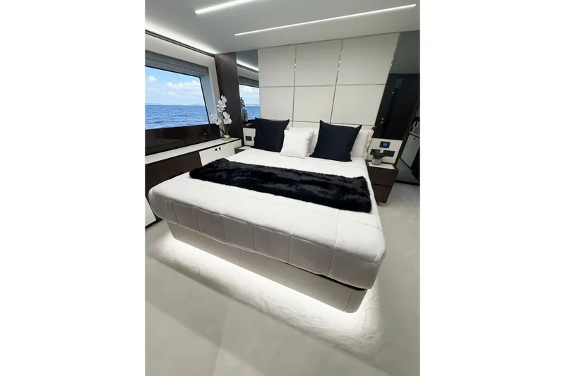 Slide: The Image of Luxurious bedroom interior on 2026 Astondoa 66 Fly yacht with ocean view. - 35