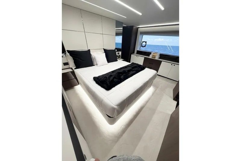 Slide: The Image of Luxurious bedroom interior of 2026 Astondoa 66 Fly yacht with ocean view. - 36