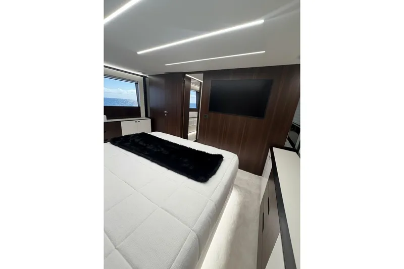 Slide: The Image of Luxurious bedroom interior of 2026 Astondoa 66 Fly yacht with ocean view. - 37