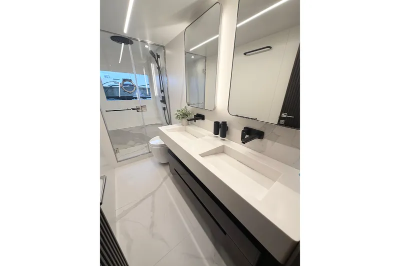 Slide: The Image of Luxurious bathroom in 2026 Astondoa 66 Fly yacht with modern fixtures and elegant design. - 38