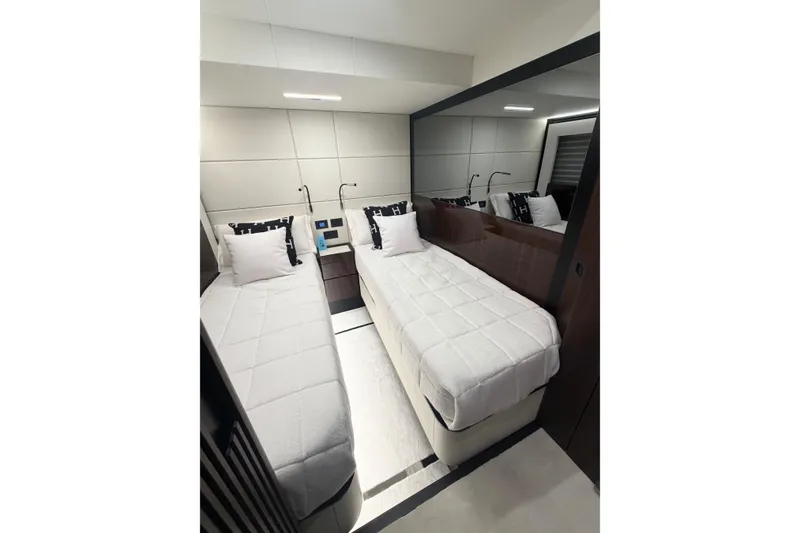 Slide: The Image of Luxurious twin bedroom in 2026 Astondoa 66 Fly yacht, featuring modern design and elegant decor. - 40