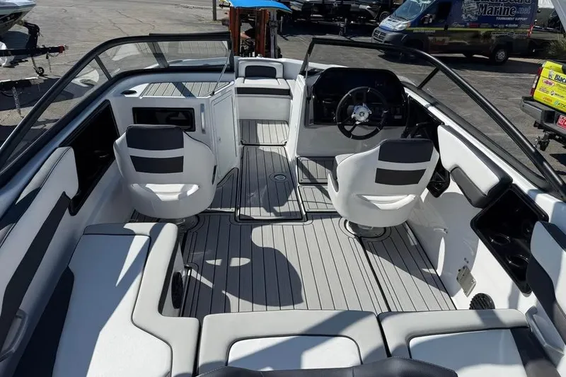 Slide: The Image of 2026 Yamaha Boats 195S interior with sleek seating and modern dashboard design. - 6