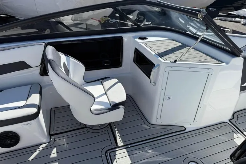 Slide: The Image of 2026 Yamaha Boats 195S interior with sleek seating and modern design. - 9