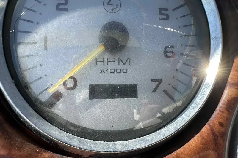 Slide: The Image of Close-up of 2003 Rinker Fiesta Vee 290 RPM gauge, showing 0 to 7 x1000 RPM. - 14
