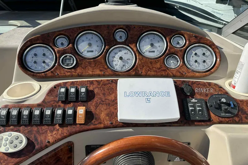 Slide: The Image of Dashboard of 2003 Rinker Fiesta Vee 290 boat with gauges and Lowrance system. - 22