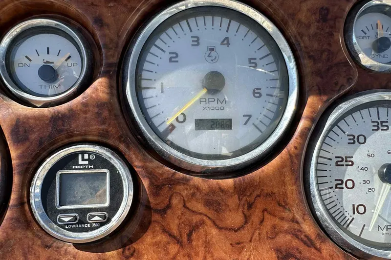Slide: The Image of Close-up of 2003 Rinker Fiesta Vee 290 boat dashboard gauges. - 9