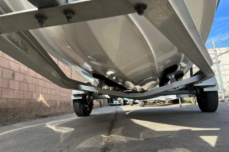 Slide: The Image of Underneath view of a 2017 Chaparral 19 H2O Sport boat on a trailer. - 15