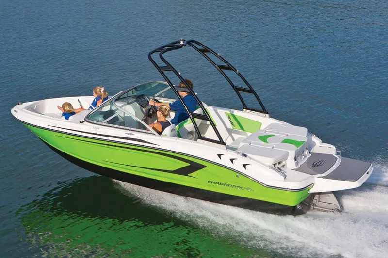 Slide: The Image of Manufacturer Provided Image: 2017 Chaparral 19 H2O Sport boat cruising on water with passengers. - 21