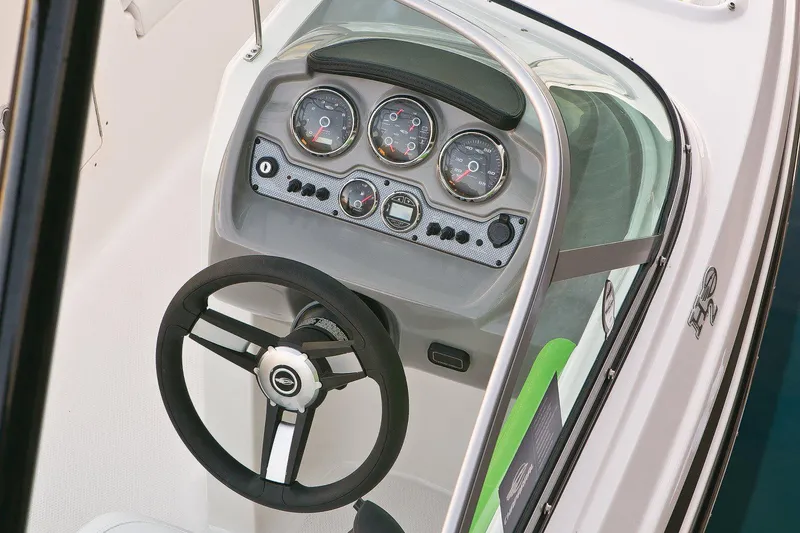 Slide: The Image of Manufacturer Provided Image: 2017 Chaparral 19 H2O Sport dashboard and steering wheel. - 25