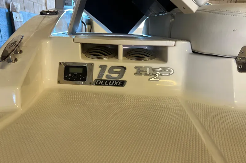 Slide: The Image of 2017 Chaparral 19 H2O Sport boat interior with deluxe features and control panel. - 5