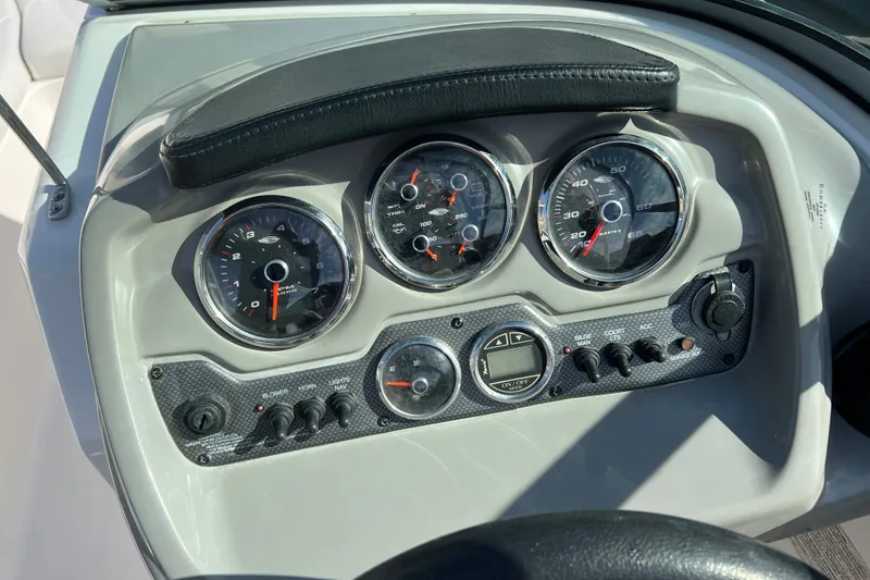 Slide: The Image of Dashboard of a 2017 Chaparral 19 H2O Sport boat with gauges and controls. - 7
