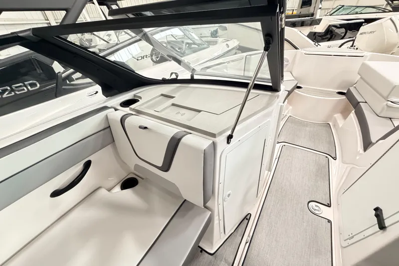 Slide: The Image of 2026 Yamaha Boats AR220 interior with sleek seating and modern design. - 13