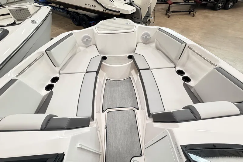 Slide: The Image of 2026 Yamaha Boats AR220 interior with spacious seating and modern design. - 14