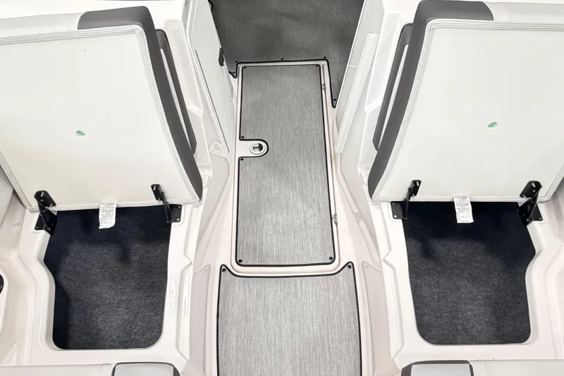 Slide: The Image of Interior view of 2026 Yamaha Boats AR220, featuring seating and flooring details. - 16
