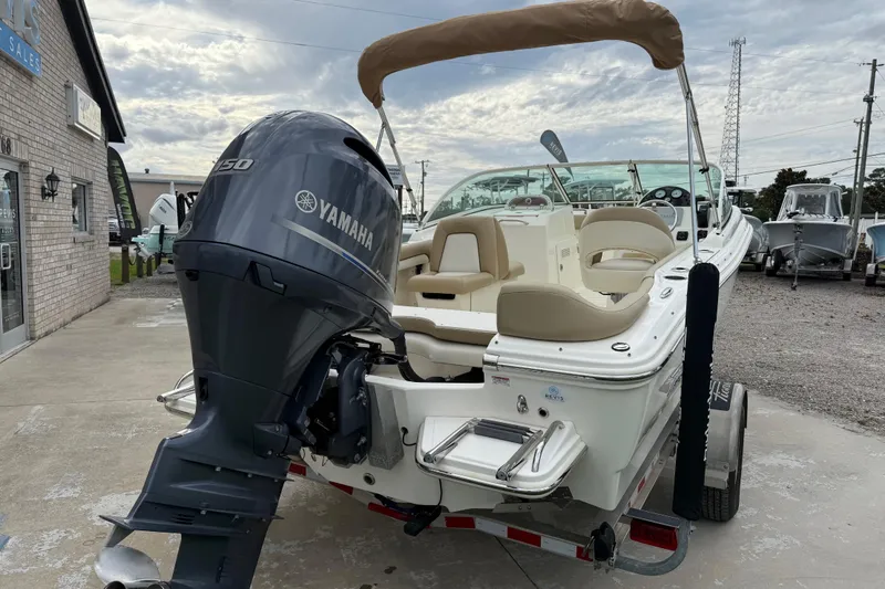 Slide: The Image of 2017 Pioneer 197 Venture boat with Yamaha outboard motor, parked on a trailer. - 10