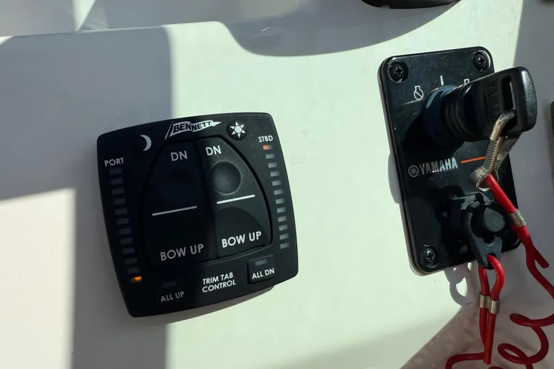 Slide: The Image of Bennett trim tab control and Yamaha ignition on 2017 Pioneer 197 Venture boat. - 19
