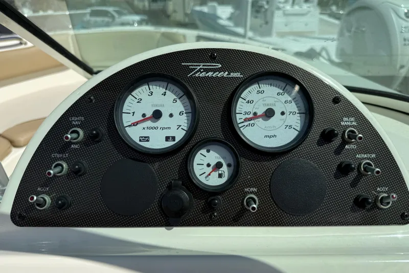 Slide: The Image of Dashboard of a 2017 Pioneer 197 Venture boat with gauges and controls. - 22