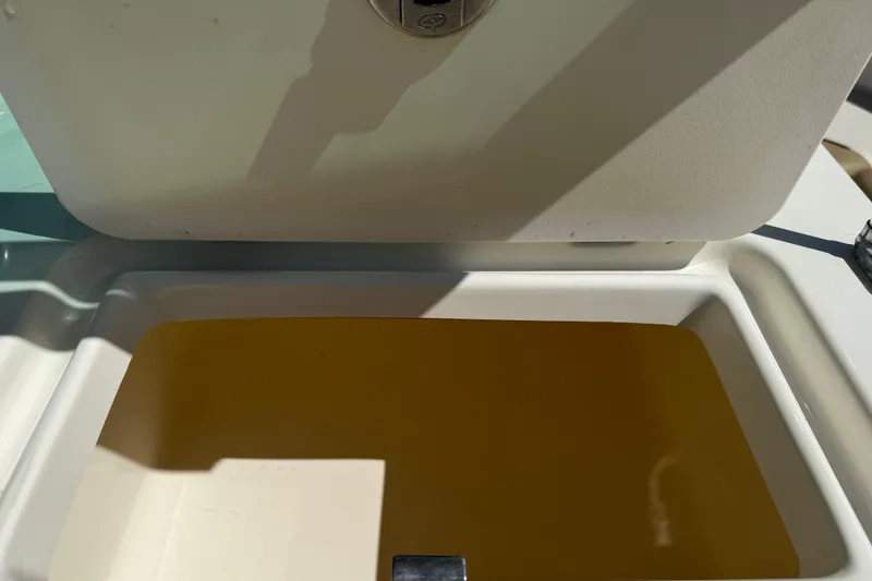 Slide: The Image of Open storage compartment on 2017 Pioneer 197 Venture boat. - 23