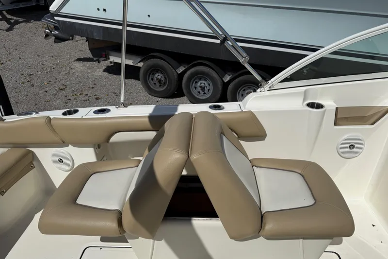 Slide: The Image of 2017 Pioneer 197 Venture boat interior with beige and white seating. - 26