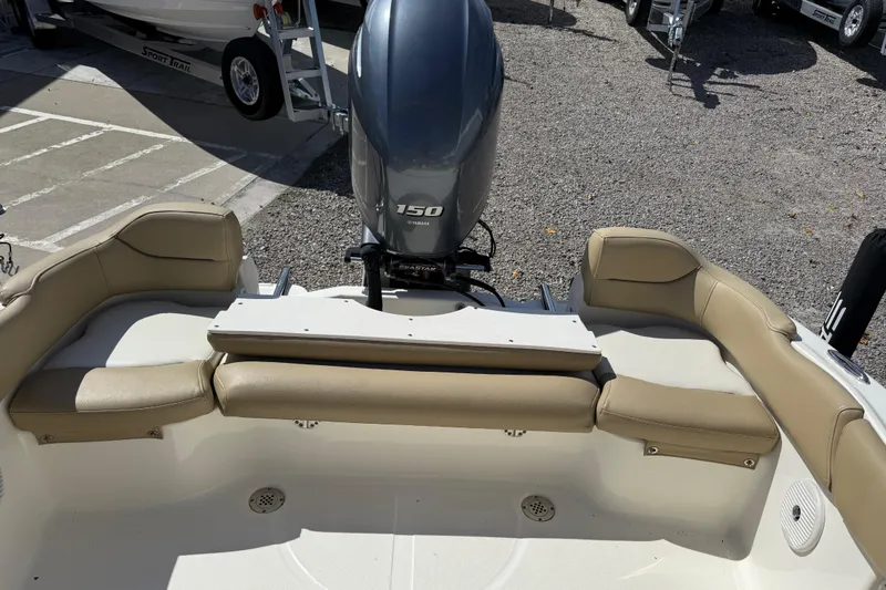 Slide: The Image of 2017 Pioneer 197 Venture boat interior with Yamaha 150 engine, beige seating. - 29