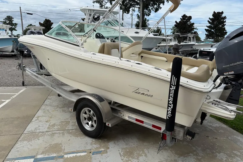 Slide: The Image of 2017 Pioneer 197 Venture boat on trailer, parked outdoors, side view. - 6