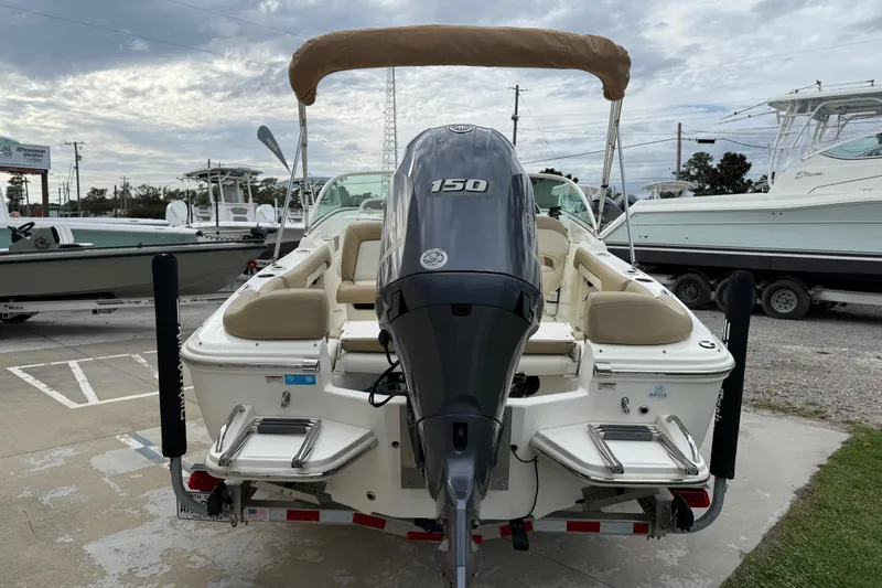 Slide: The Image of 2017 Pioneer 197 Venture boat with Yamaha 150 engine, docked outdoors. - 9
