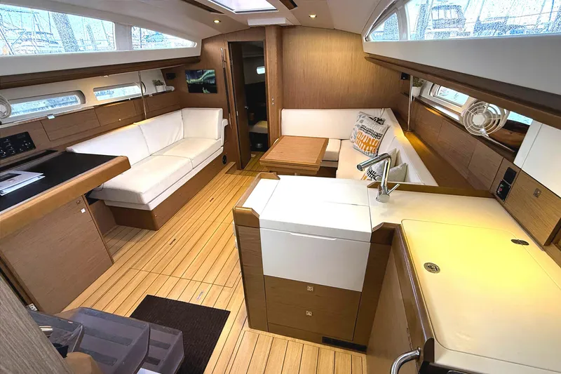Slide: The Image of Luxurious interior of 2013 Jeanneau Sun Odyssey 44 DS sailboat with modern furnishings. - 5
