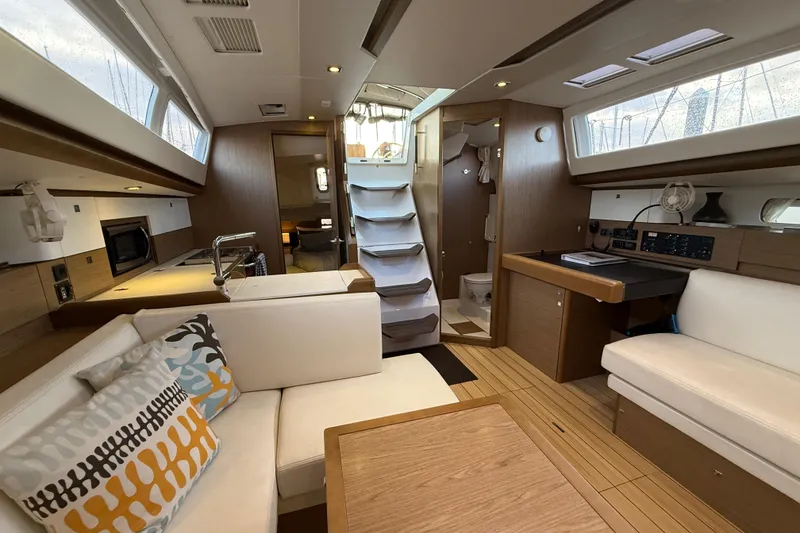 Slide: The Image of Interior of 2013 Jeanneau Sun Odyssey 44 DS yacht, featuring modern design and comfortable seating. - 6