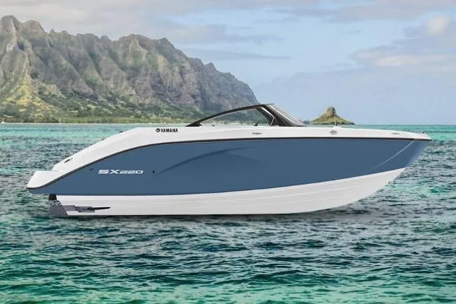 Slide: The Image of 2026 Yamaha Boats SX220 on turquoise water with scenic mountain backdrop. - 7