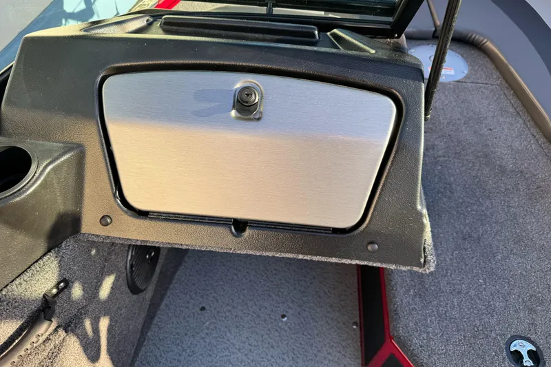 Slide: The Image of 2026 Lund 1775 Adventure Sport boat dashboard with storage compartment. - 16