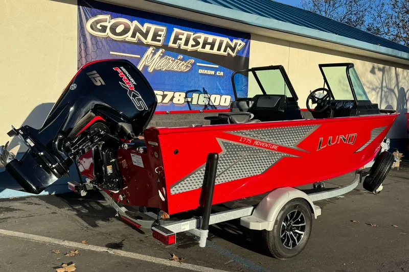 Slide: The Image of 2026 Lund 1775 Adventure Sport boat with powerful outboard motor on display. - 2