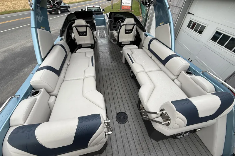 Slide: The Image of 2026 Avalon 2585 Excalibur boat interior with luxurious seating and modern design. - 13