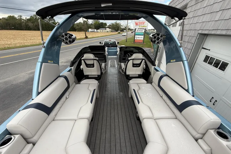Slide: The Image of 2026 Avalon 2585 Excalibur boat interior with luxurious seating and modern design. - 16