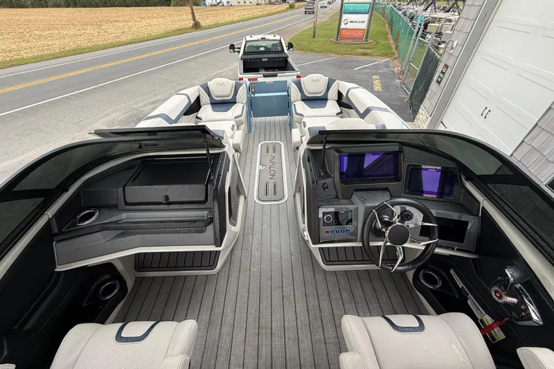 Slide: The Image of 2026 Avalon 2585 Excalibur boat interior with luxurious seating and modern design. - 18