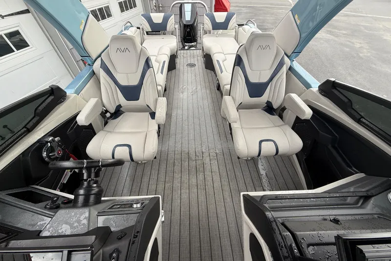 Slide: The Image of 2026 Avalon 2585 Excalibur boat with Mercury 400hp V-10 engine, rear view. - 23