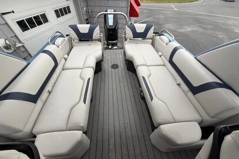 Slide: The Image of Steering console of 2026 Avalon 2585 Excalibur boat with modern controls and displays. - 25